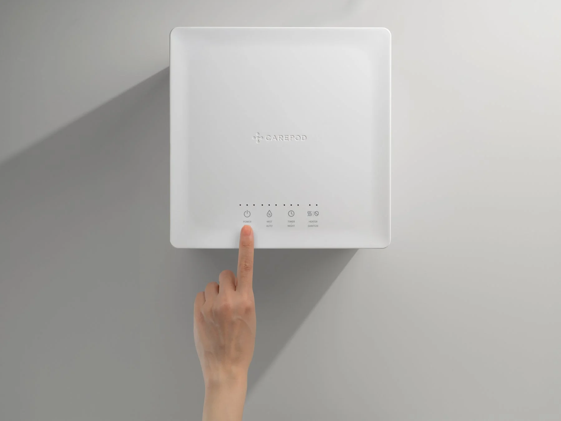 白い四角い家電製品の操作パネル