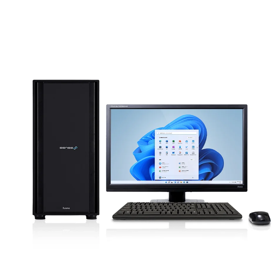 白い背景に、黒いデスクトップPC本体、モニター、キーボード、マウスが配置されたコンピューターセットアップの画像です。