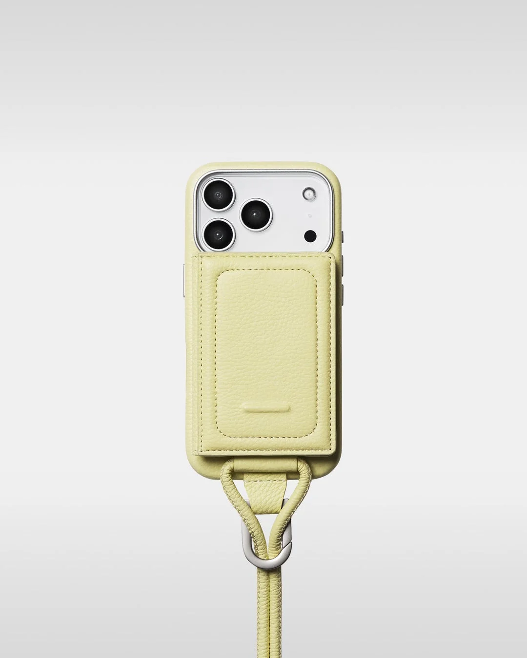 淡いライムイエローのiPhoneケースとショルダーストラップ