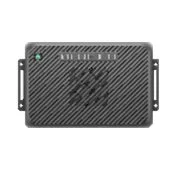 表面にテクスチャが施された濃い灰色の長方形の電子機器で、上部には複数のインジケーターライトが見られます。ネットワーク機器や制御装置のような外観です。