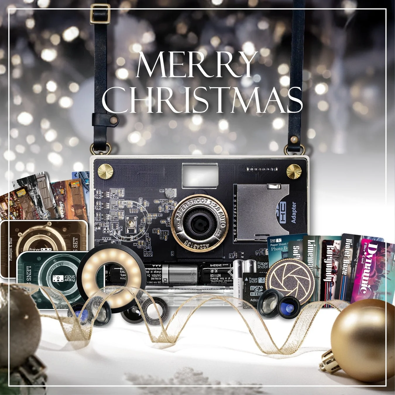 ボケたイルミネーションを背景に、ペーパーシュートカメラ、様々なレンズやフィルターなどのアクセサリー