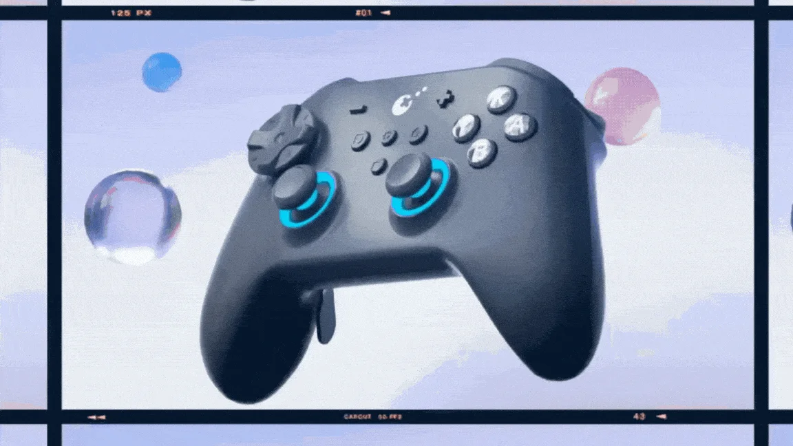 青いアクセントが特徴的なダークグレーのゲームコントローラーが、淡い青と紫の背景に浮かんでいます。複数の半透明なカラフルな球体が周囲を浮遊しており、モダンで幻想的な雰囲気を醸し出しています。