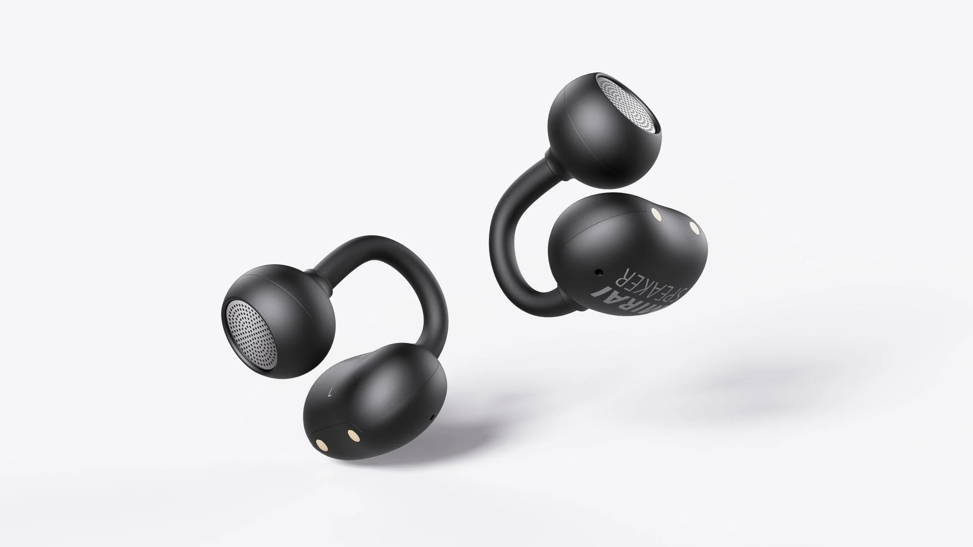 白い背景に、黒く湾曲したデザインの「MIRAI SPEAKER」というオーディオ機器が2つ浮いているように配置されています。モダンで未来的な印象を与えるスピーカーです。