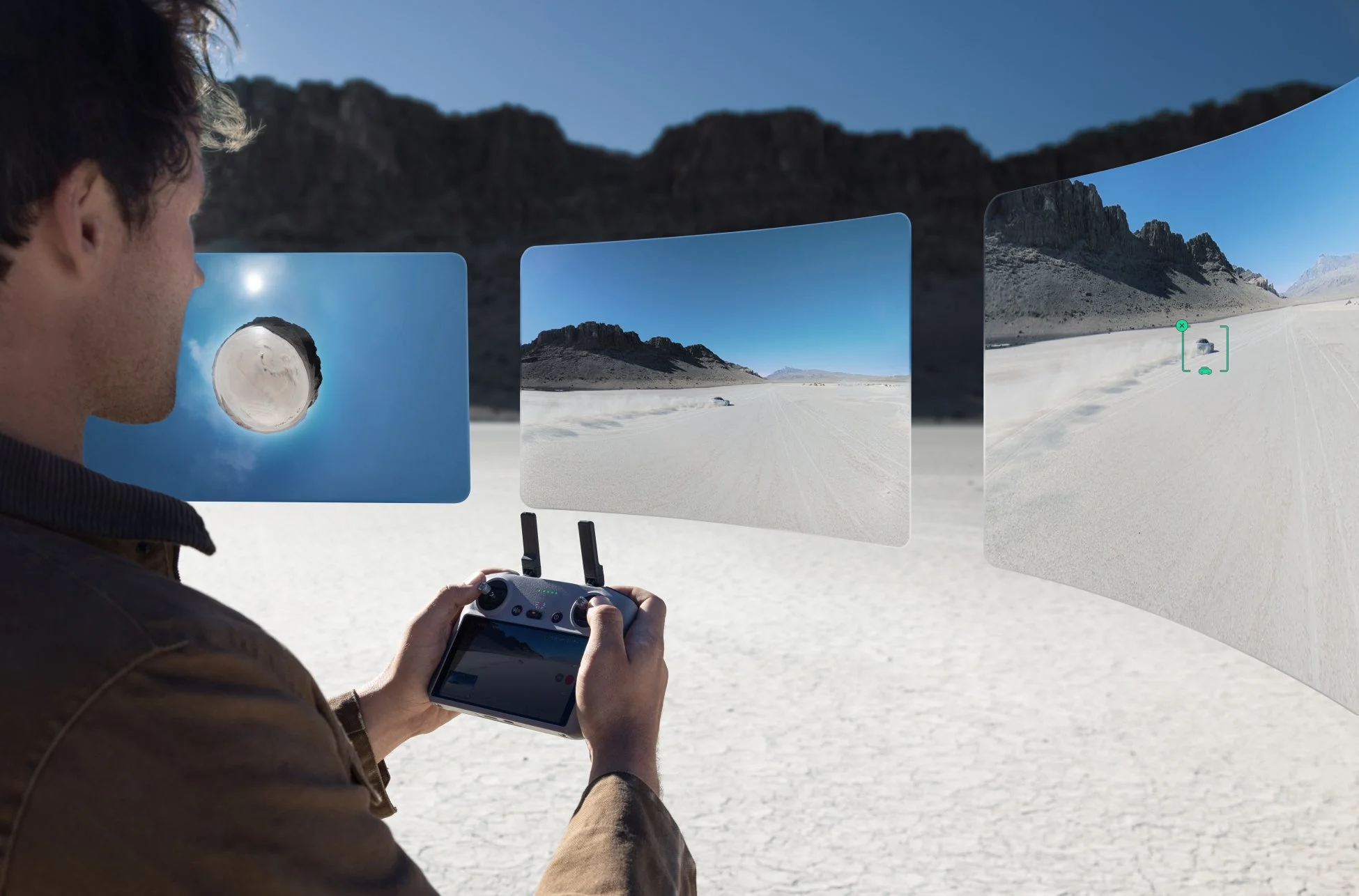 広大な砂漠でドローンを操作する様子