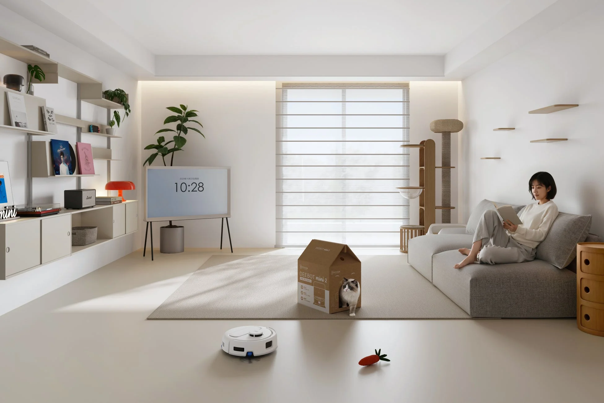 リビングで読書する女性とロボット掃除機