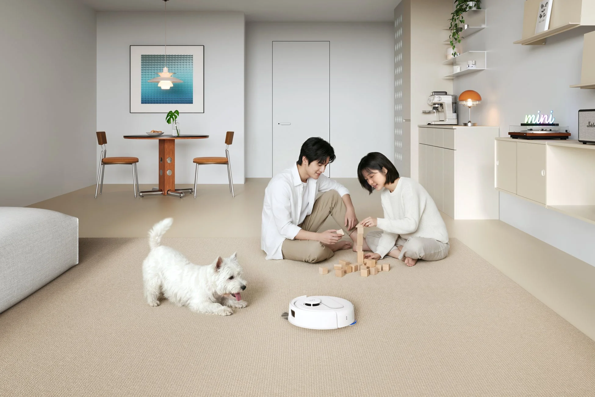 カップルと犬とロボット掃除機と積み木