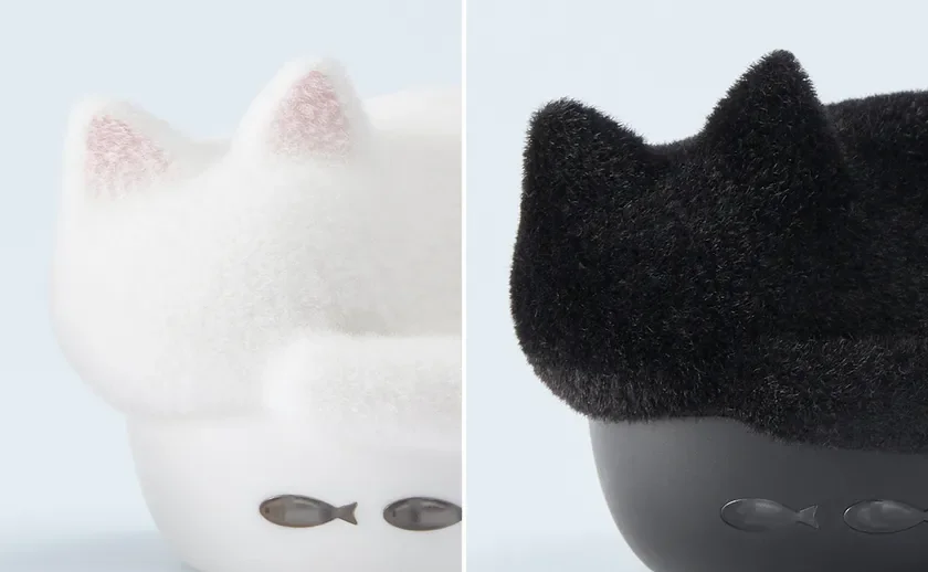 白と黒の猫の形をしたオブジェが並んでおり、上部はふわふわとした毛並みを表現