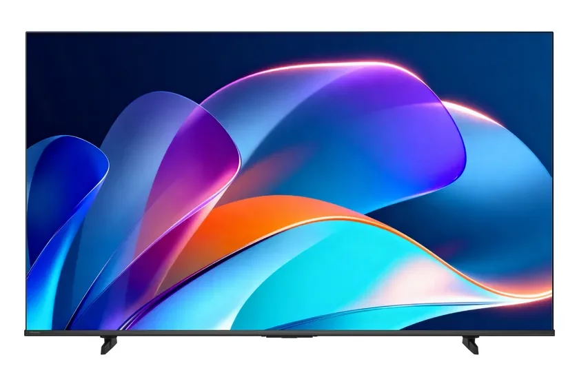 カラフルな抽象的な壁紙が表示されている薄型テレビ