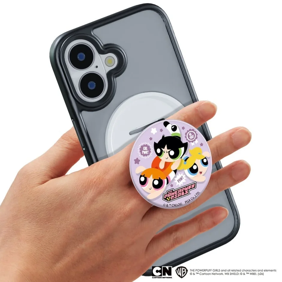 手に持たれたスマートフォンに装着されたマグネットグリップ