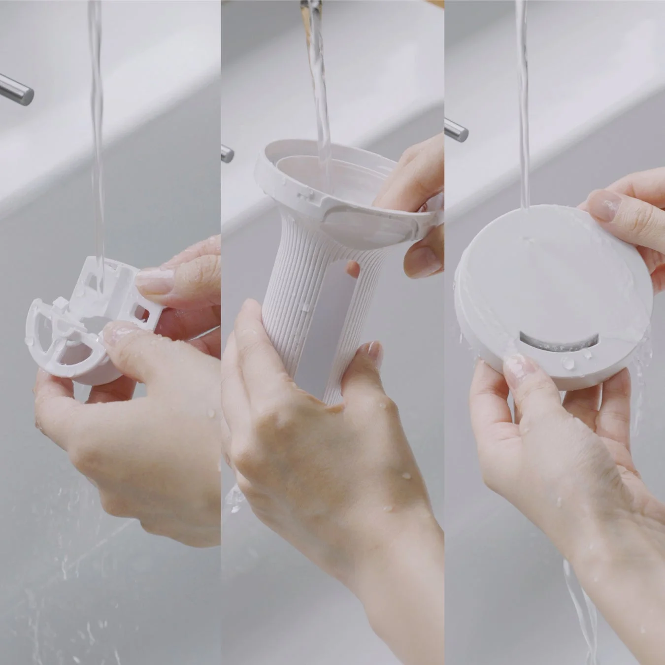白いプラスチック製の家電部品をシンクで手洗いしている様子